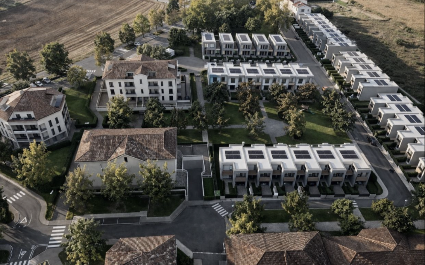 Aerial masterplan of Gardens of Rimini showing villa clusters, residential buildings, green areas and roads
